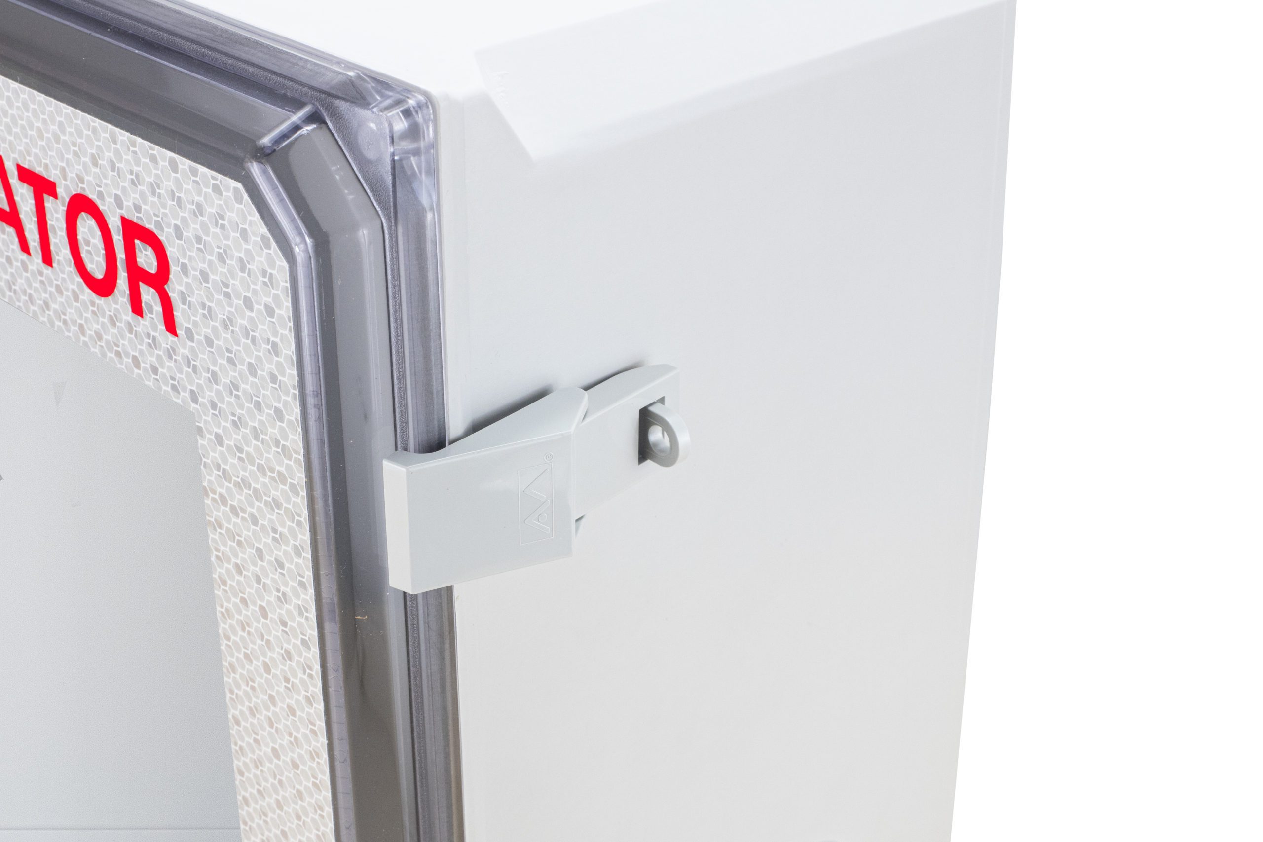 Detail view of closing latch on outdoor AED wall cabinet